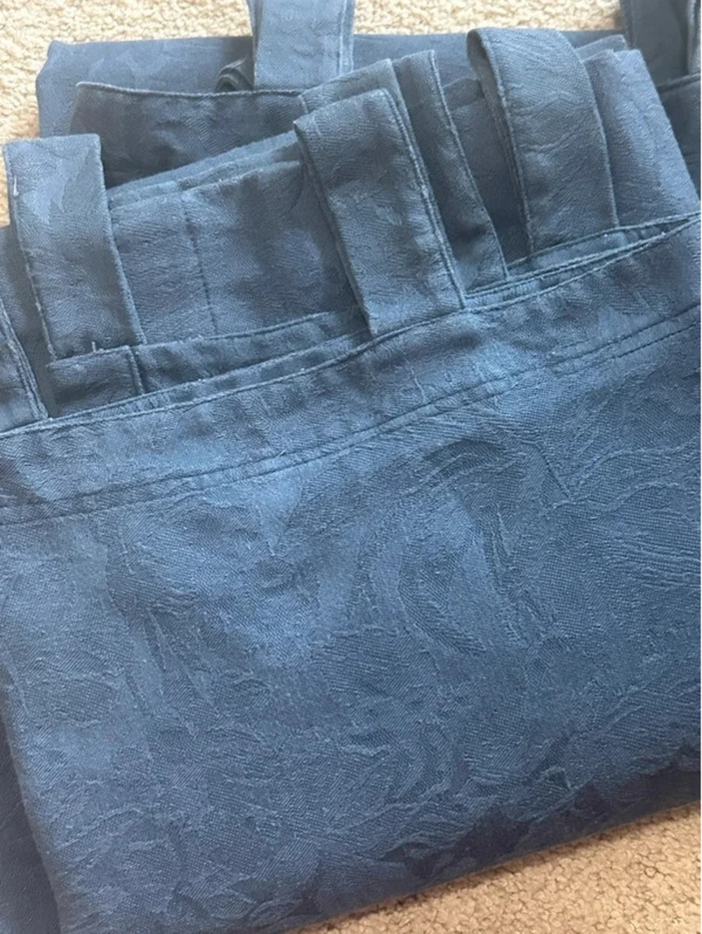 Tabbed room darkening drapes